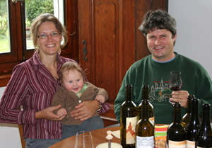 Claude Alain-Chollet with wife Tina and baby